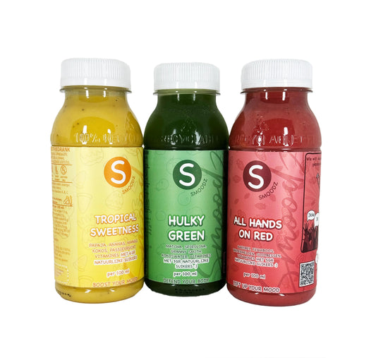 Flesjes uit het Totally Spice Pakket, ontworpen om je energie en smaakpapillen te prikkelen.